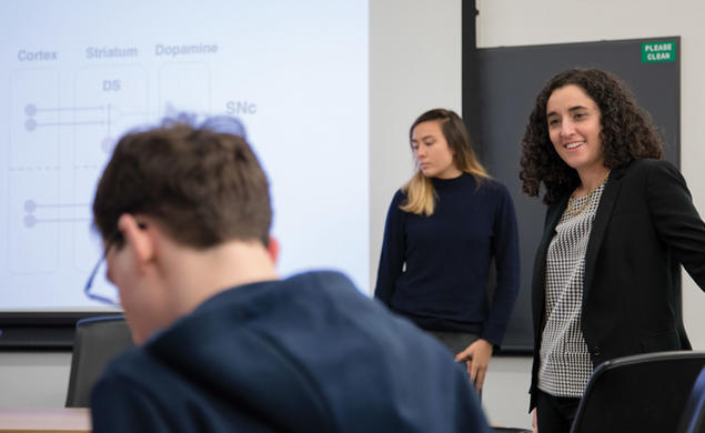 Neuroscience professor Ilana Witten speaks in class in front of students