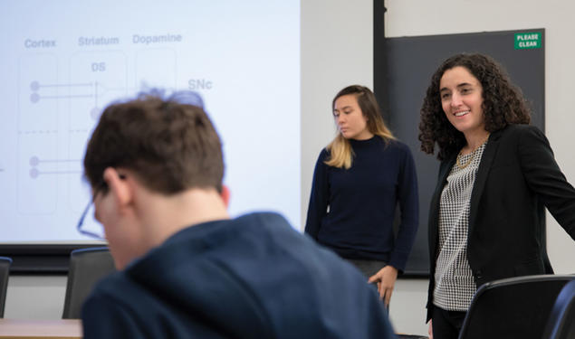 Neuroscience professor Ilana Witten speaks in class in front of students