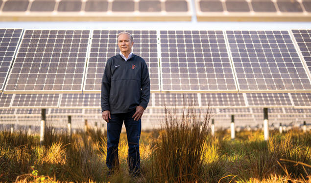 Tom Leyden ’77 at a University solar farm