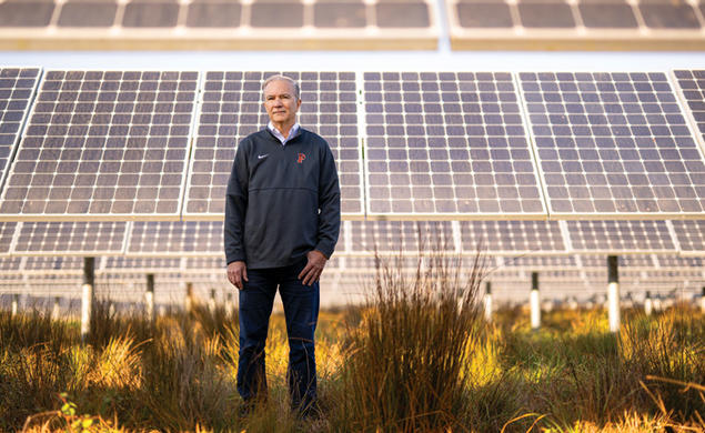 Tom Leyden ’77 at a University solar farm
