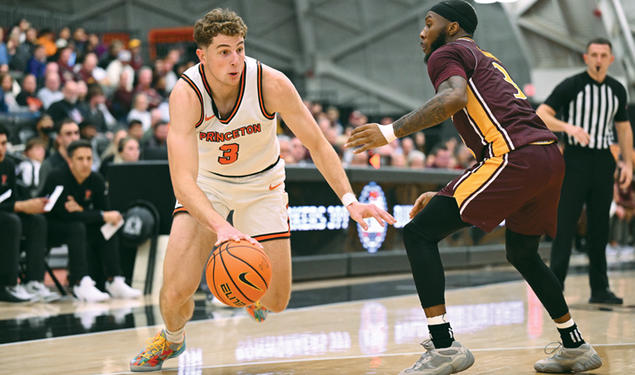 Caden Pierce ’26 drives to the basket against Iona Nov. 4, when he scored  18 points in Princeton’s comeback win.