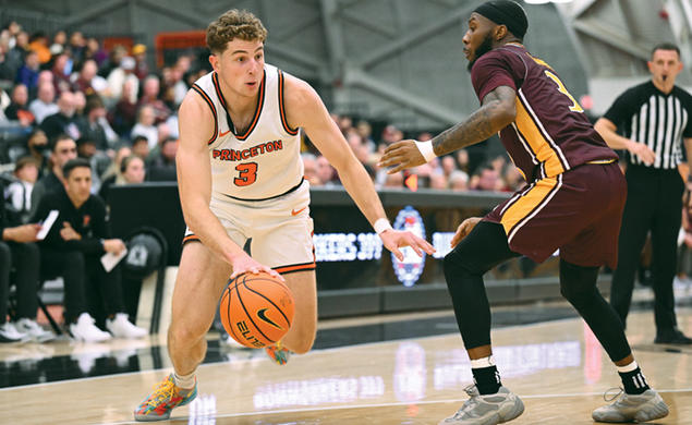 Caden Pierce ’26 drives to the basket against Iona Nov. 4, when he scored  18 points in Princeton’s comeback win.
