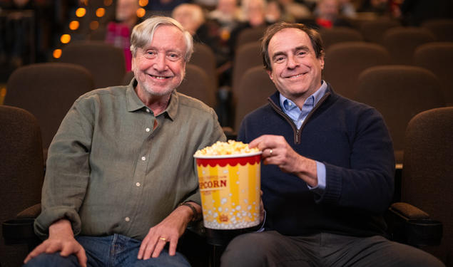 Professor Sean Wilentz and Princeton Alumni Weekly senior writer Mark. F. Bernstein ’83 sharing a tub of popcorn at the Garden Theater.