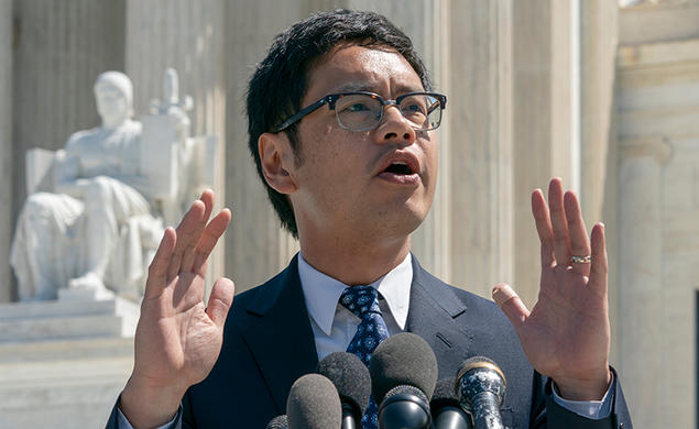 Dale Ho ’99 speaks to reporters after he argued before the Supreme Court against the Trump administration’s plan to ask about citizenship on the 2020 census in 2019. 