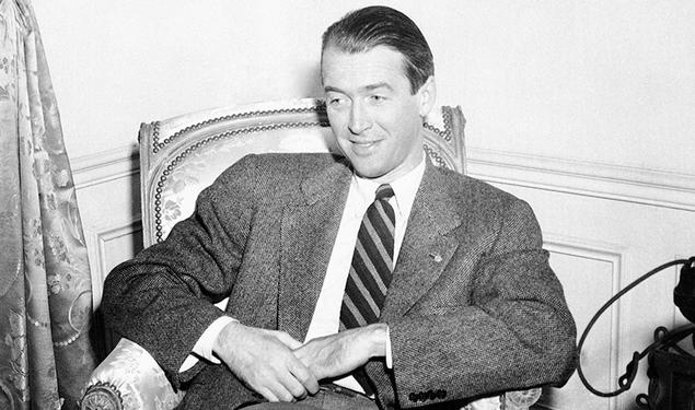 Screen star Jimmy Stewart ’32 relaxes in his suite at the Waldorf-Astoria in New York on Jan. 11, 1946. 