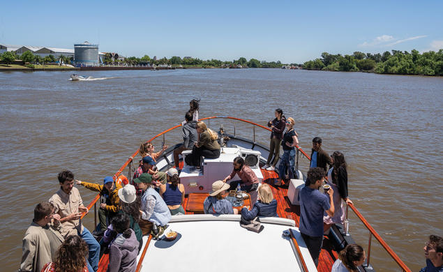Princeton Journeys participants  ride a boat along the Tigre Delta  outside of Buenos Aires, Argentina. 