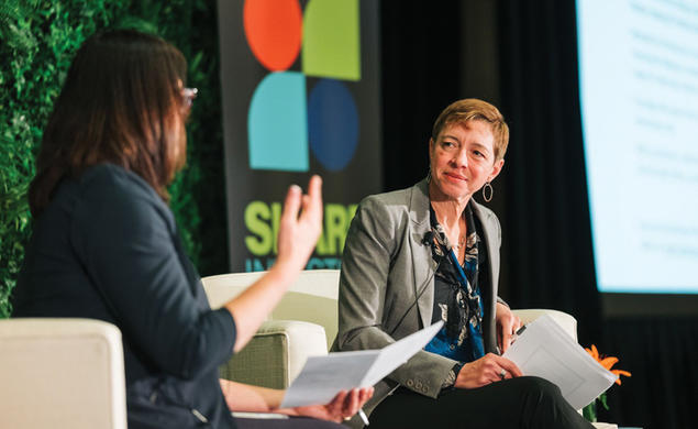Layna Mosley on stage at the Share Investor Summit