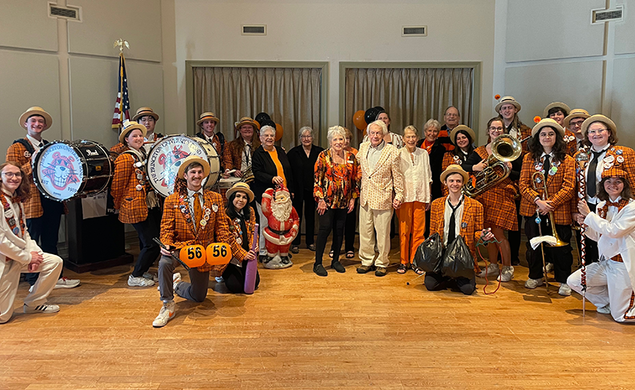 Band members and residents pose at a retirement community in New Jersey