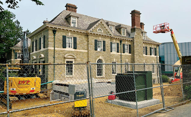 Construction equipment and fencing surrounds Charter Club