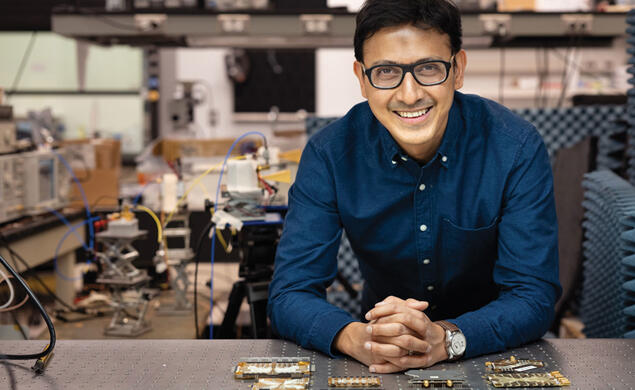 RESEARCH_Kaushik Sengupta.jpg Kaushik Sengupta in what looks like an electrical engineering lab.