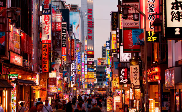 Tiger-Travels_Tokyo_Tom-Downey.jpeg View of city street in Tokyo, Japan filled with signs and advertisements.
