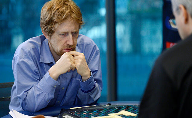 Adam Logan ’95 concentrates in a Scrabble match.