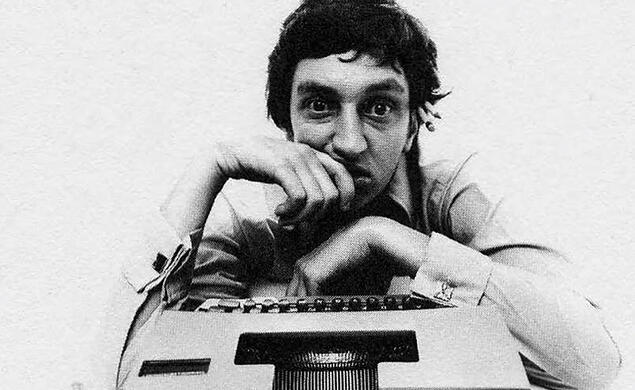 Al Mifflin Lowe with a typewriter.