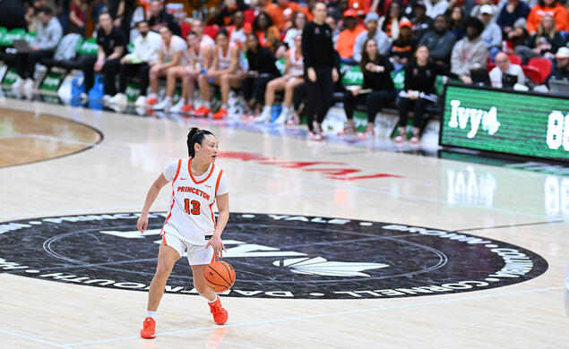 ashley-chea-ivy-final.jpg Basketball player Ashley Chea dribbles the ball with her left hand near half court