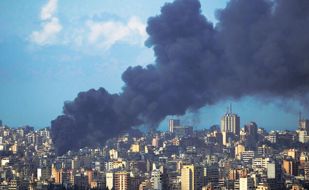 Smoke rises after an Israeli airstrike in early April hit a building in Beirut, several miles from Lebanese American University.