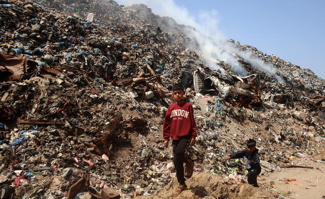 Children search for items to salvage at a waste dump in Gaza City, Palestinian Territories, on April 19, 2026.
