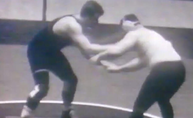 Chuck Dressel ’71, left, wrestling for Princeton against Penn in 1969.