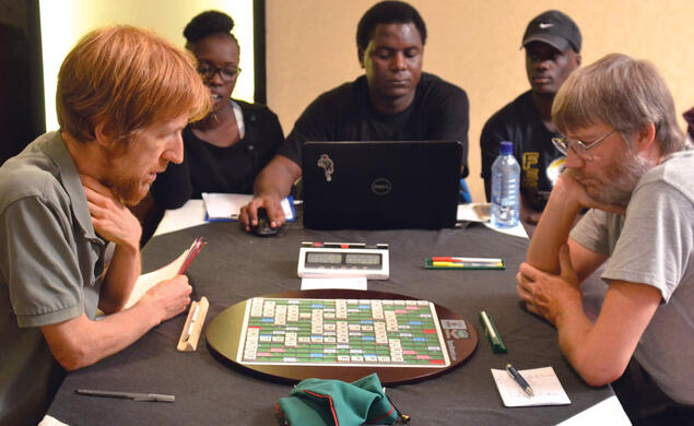 PRINCE_Scrabble 1.jpg Adam Logan ’95, left, began playing Scrabble at an early age and entered his first tournament around age 10. Since then, he’s played around 2,700 games.