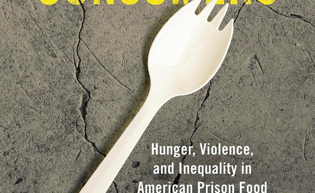 A spork on cracked concrete with the title surrounding it