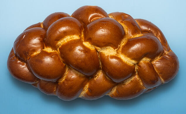 JEWISH_Challa 2.jpg Challa bread on blue background