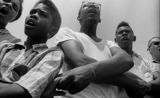 Freedom School, Mileston. Mississippi Summer Project, 1964:  Summer volunteers, SNCC workers and local students singing freedom songs at Mileston, a community of independent black farmers in the Mississippi Delta near Lexington.