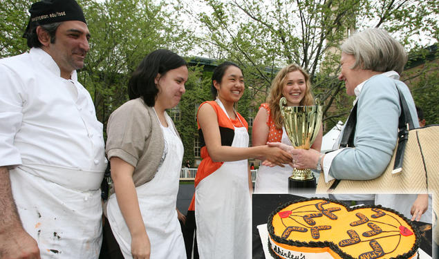 President Tilghman congratulates the winners of the "Iron Tiger" cake contest. Their design, inset, featured the motto "Under Shirley's power we flourish."