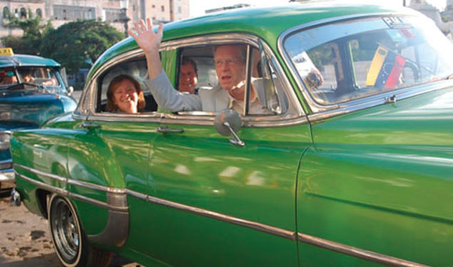 Frederick Hilles ’60, in the front seat, and in the back his wife, Jane Osgood, and Lee Fuller ’60 in Cuba last October. 