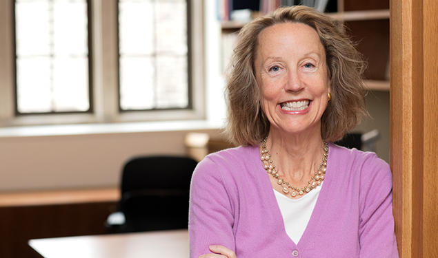 Anne Case, photographed in front of an empty office.