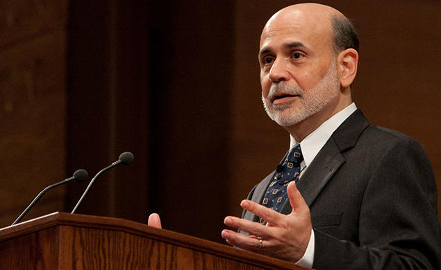 Ben Bernanke speaks at a podium.