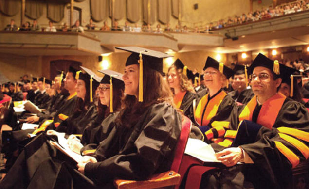 Advanced-degree recipients listen to George Will *68