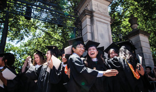 Mission accomplished: Graduates celebrate after the ceremony.