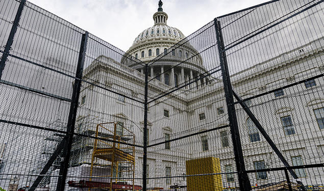 Metal barricades surround the West Front of the Capitol building in Washington during an extensive repair, maintenance, and preservation project on July 29.