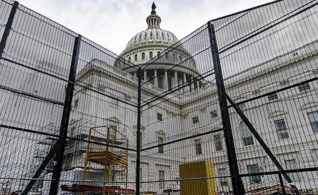 Metal barricades surround the West Front of the Capitol building in Washington during an extensive repair, maintenance, and preservation project on July 29.