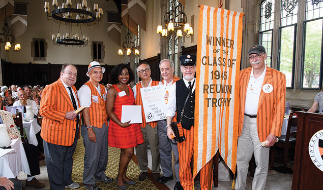 Class of '67 poses with trophy