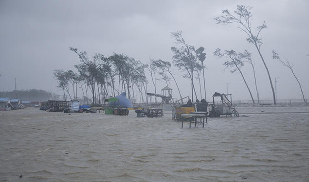 This is an AP photo of beach vendors’ kiosks surrounded by water during high tide at the Digha beach on the Bay of Bengal coast as Cyclone Yaas intensified on May 26, 2021.