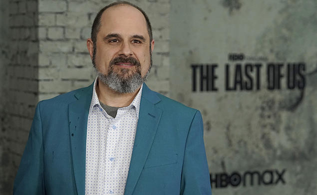 Craig Mazin ’92, the creator/executive producer/writer/director of "The Last of Us," poses at the premiere of the HBO series, Monday, Jan. 9, 2023, at the Regency Village Theatre in Los Angeles. 