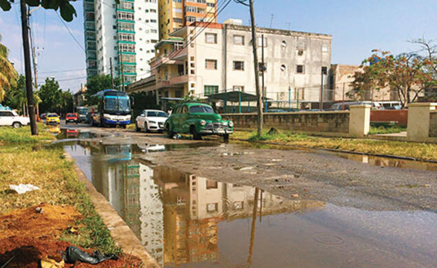 The Vedado neighborhood of Havana after a thunderstorm. Poor drainage often left streets flooded.