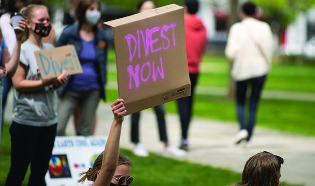 Protestors with Divest Signs