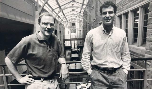 Photo of David Card *83, left, and Alan Krueger