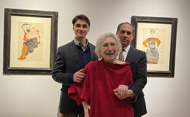 Timothy Reif ’80 *85 with his son, Paul Reif, and his mother, Rita Reif, photographed at Christie’s in New York in December with the two paintings that were the subject of Reif v. Nagy.