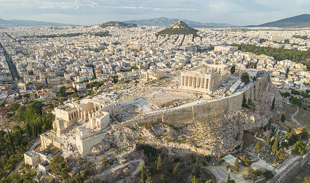 Aerial panoramic view from a drone of the Acropolis of Athens, a rocky outcrop above the city of Athens with many remains of several ancient buildings, the most famous of them is the Parthenon Temple a citadel with Classical architecture.