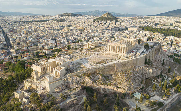 Aerial panoramic view from a drone of the Acropolis of Athens, a rocky outcrop above the city of Athens with many remains of several ancient buildings, the most famous of them is the Parthenon Temple a citadel with Classical architecture.