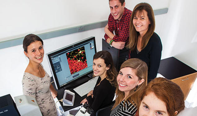 Professor Elizabeth Gould, top right, with members of her lab, from left, Lyra Olson ’16, Maya Opendak GS, Adam Brockett GS, postdoc Elise Cope, and Lily Offit ’15.