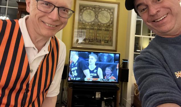 Dean Menegas ’83 and Mark F. Bernstein ’83 form a two-man Princeton watch party early Saturday morning in London.