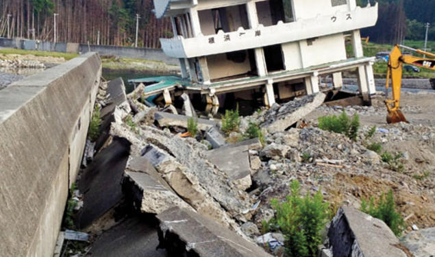 The ruined remains of a guesthouse and bayfront walkway in Kamaishi, Japan, 16 months after the March 2011 earthquake and ­tsunami that devastated the country’s northeastern coast.