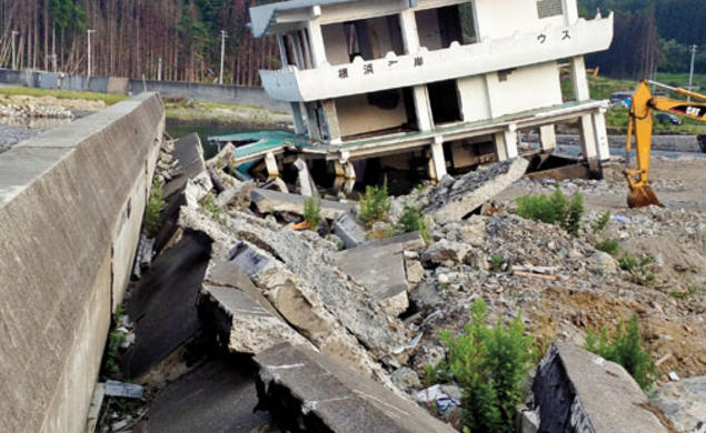 The ruined remains of a guesthouse and bayfront walkway in Kamaishi, Japan, 16 months after the March 2011 earthquake and ­tsunami that devastated the country’s northeastern coast.