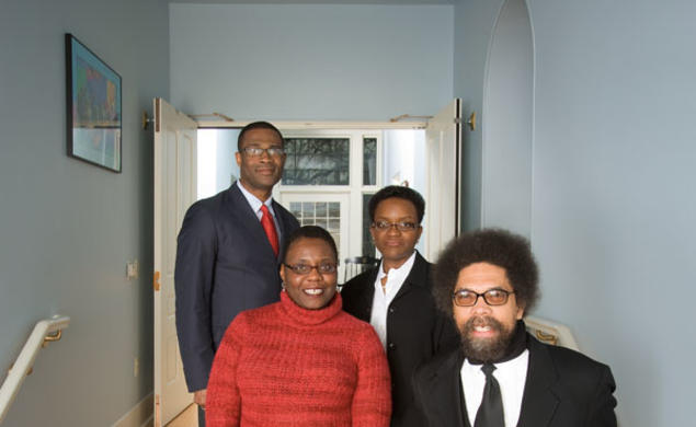 Professors in the Center for African American Studies stand in the foyer of their new home, historic--and recently renovated--Stanhope Hall.  Clockwise, from top left: Wallace Best, center director Valerie Smith, Cornel West *80, and associate director No
