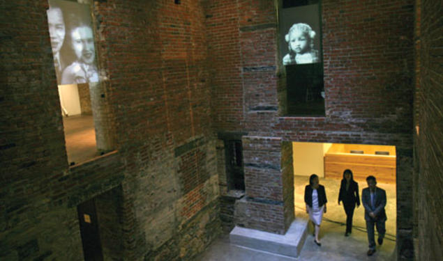 Charles Lai ’78, below, co-founded and until recently was executive director of the Museum of Chinese in America, which celebrated its move and renovation Sept. 22. Above, the museum’s atrium, which represents a traditional Chinese courtyard.