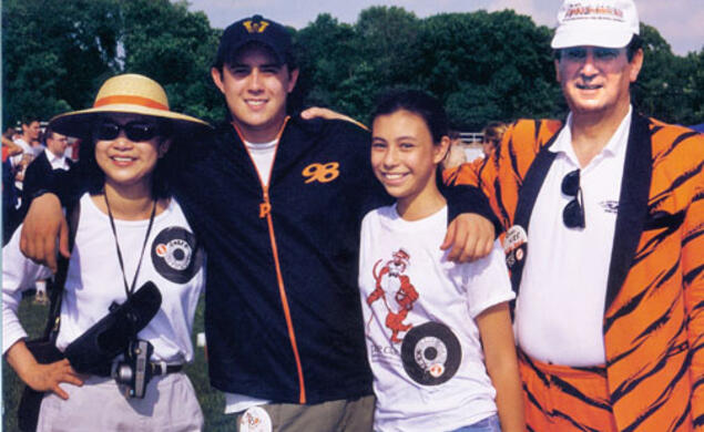 David Nee ’98 with his parents, Amber and Owen ’65, and sister Alex ’06 at Reunions in 1998.