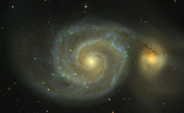 Messier 51, as observed in the Sloan Digital Sky Survey, is actually two galaxies in collision. The impact, which will take 100 million years to complete, creates the spiral arms and the spray of stars visible at the right. Known as the Whirlpool Galaxy, 